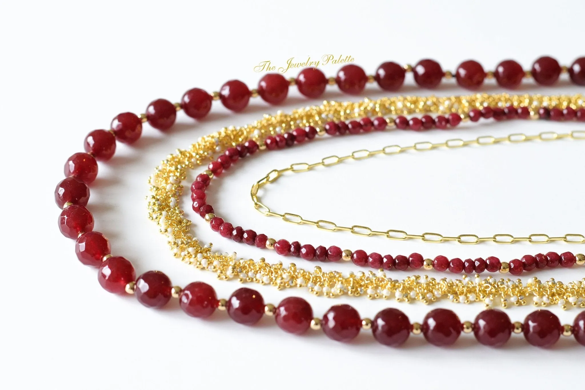 Irene luxurious maroon and gold four tier necklace