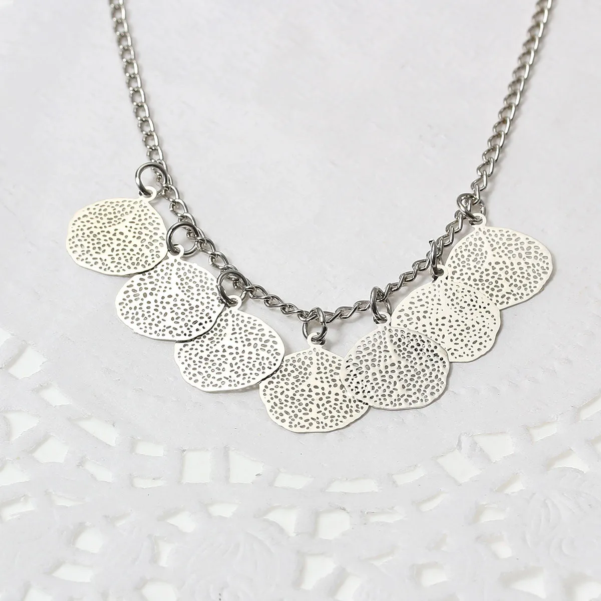 SEXY SPARKLES Filigree Stamping Bell Bracelet Silver Tone Whit Hollow Leaf Pendants